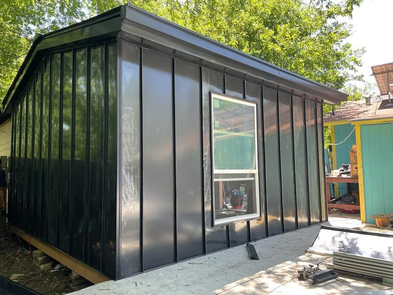 Black standing seam metal wall panels for Metal Roof Installation in West Manchester