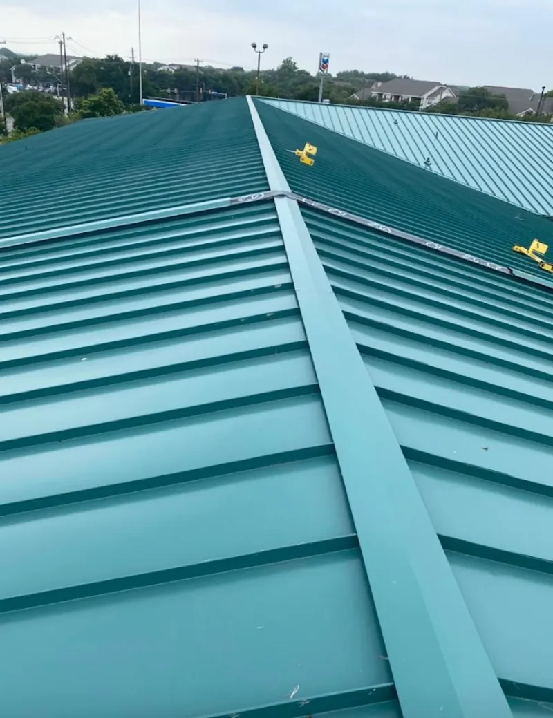 Green commercial metal roof ridge and valley for Metal Roof Repair in West Manchester